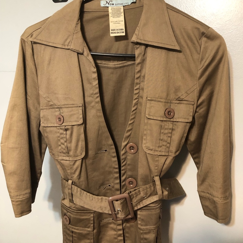 Large khaki waist length jacket. Never worn